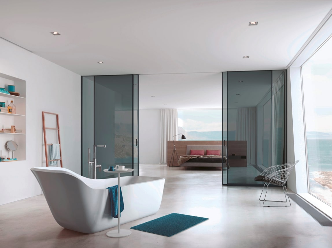 Luxury wardrobes Air room divider by UECKO with large glass panels inspired by Mediterranean architecture